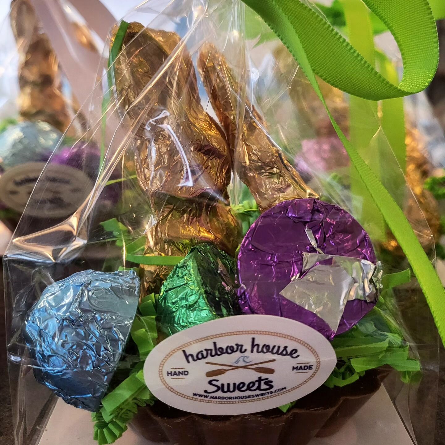 Easter Treats! Foiled chocolates and bunnies sitting on top of a chocolate basket. #washburnwisconsin , #lakesuperior , #bayfieldwi , #chocolateshop ,#chocolatebunny ,#easterbasket