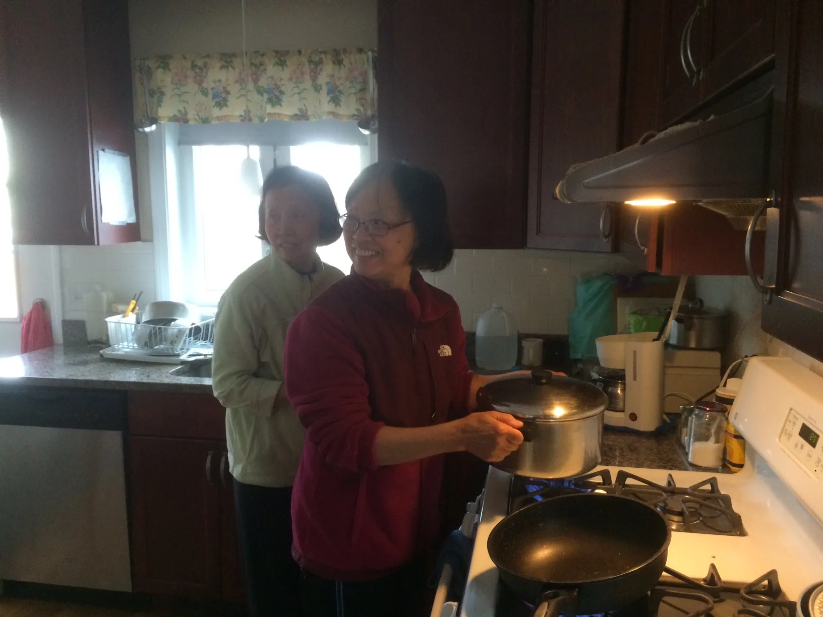 Di Phung and Di Minh making lunch