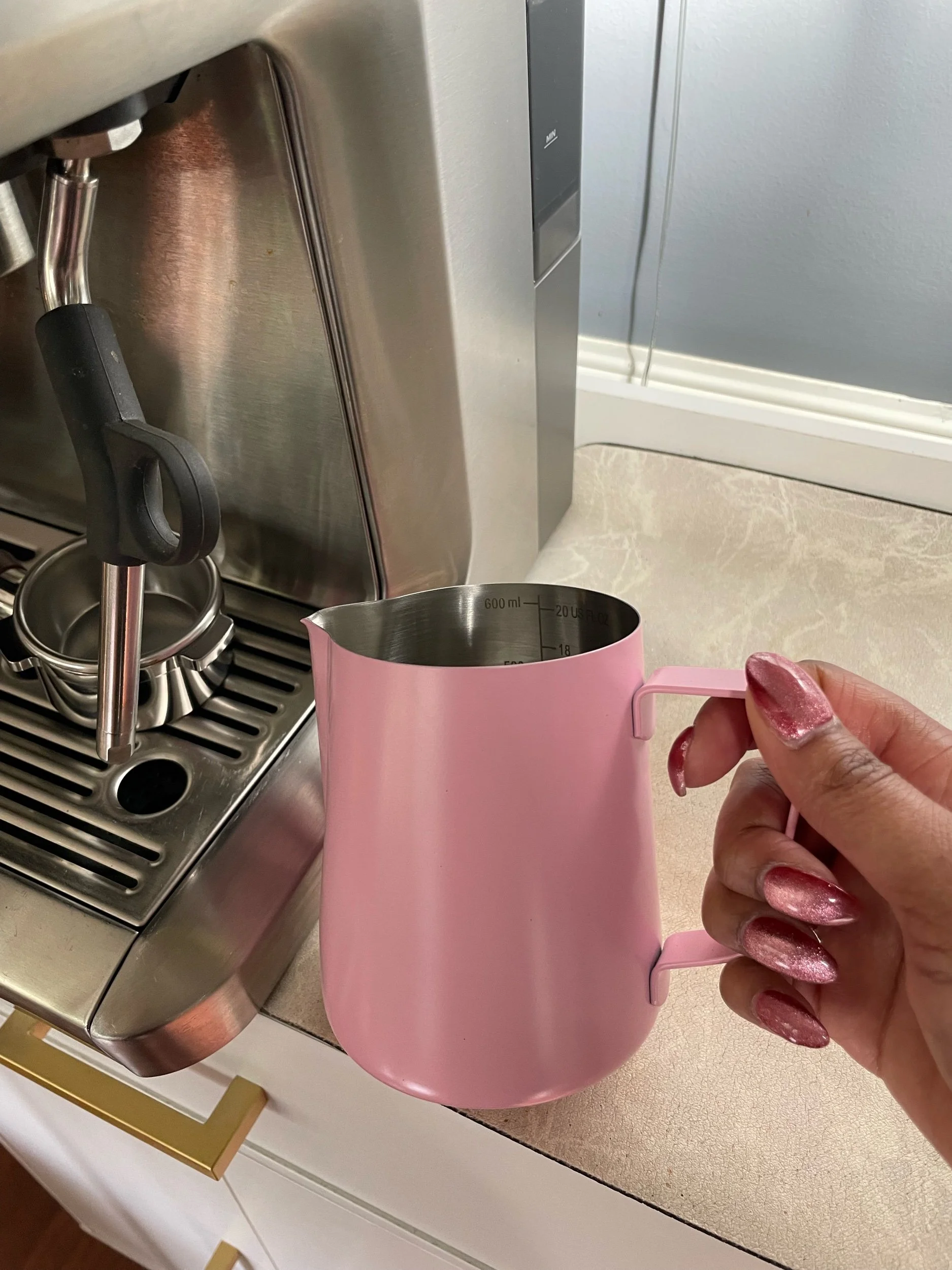 Pink milk frothing pitcher 