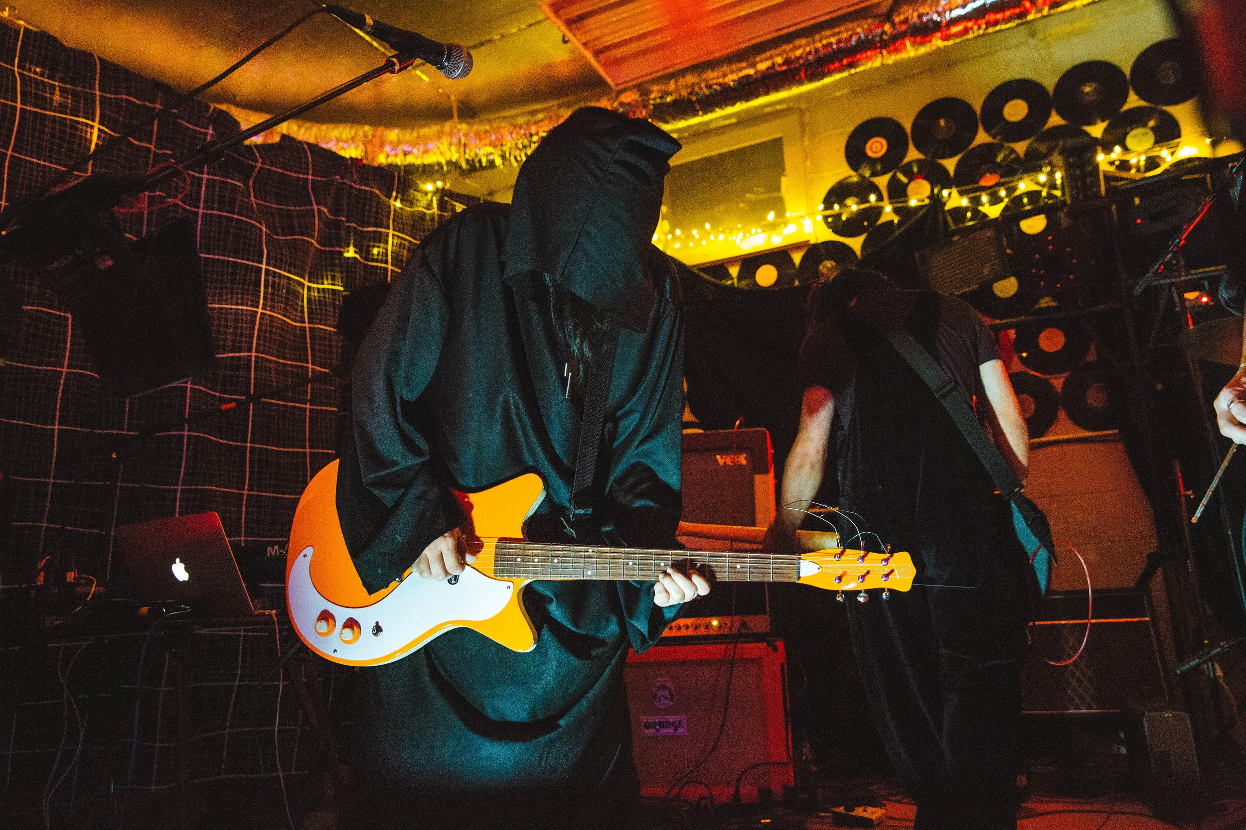 That orange Danelectro is everything...
