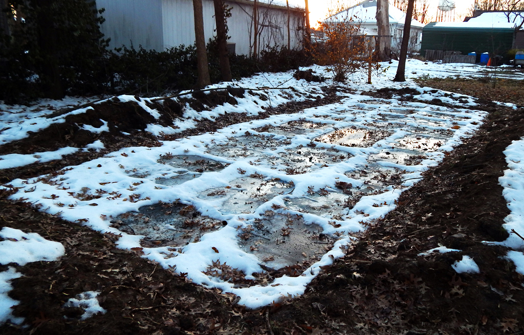Dead Paintings no. 10 (2014). Acrylic and mixed-media paintings placed in an earth trench.