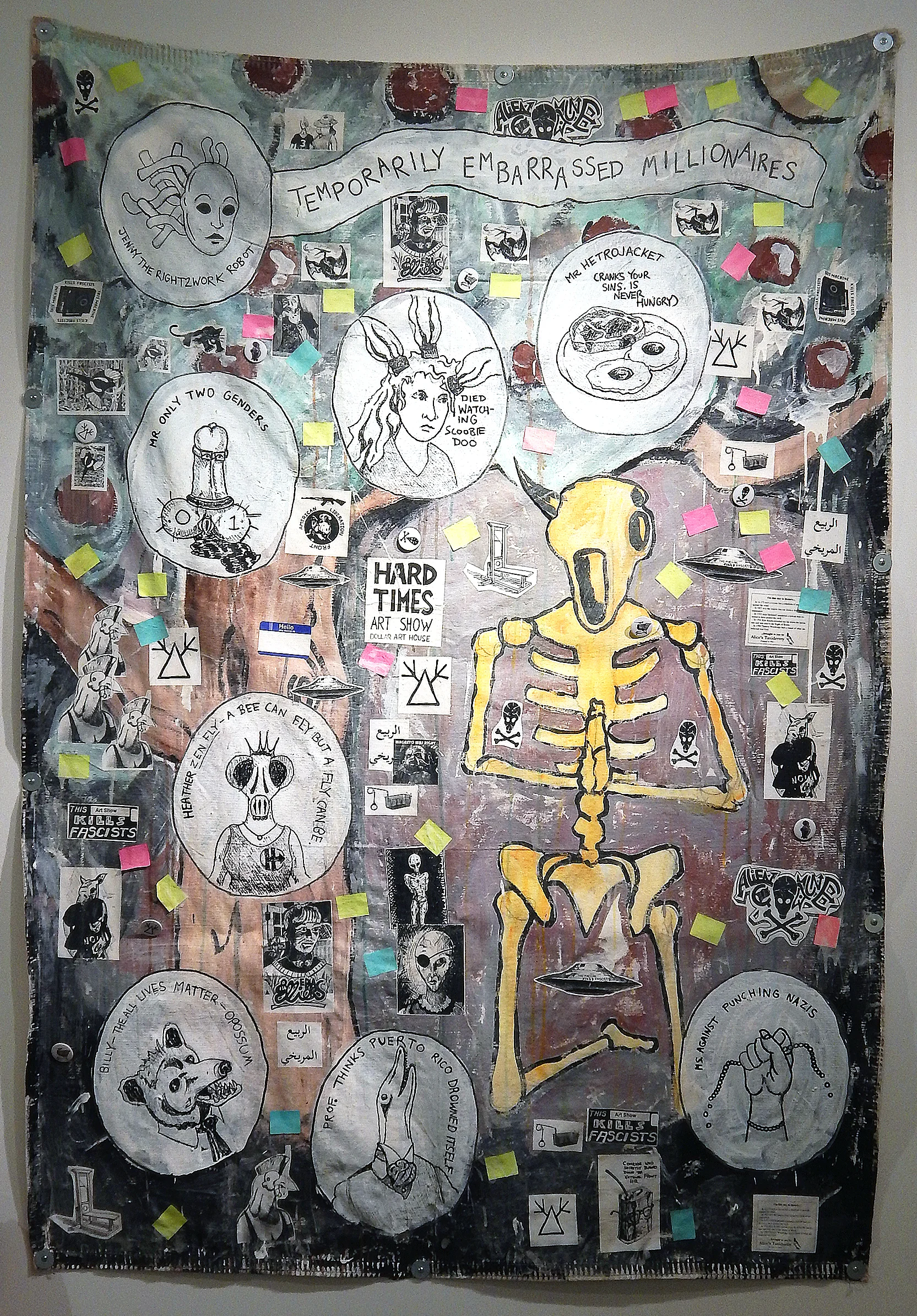 Temporarily Embarrassed Millionaires. Acrylic, stickers, marker, photocopies, buttons, post-it notes, coffee and mixed media on canvas tarp (2017) (Adam Turl)