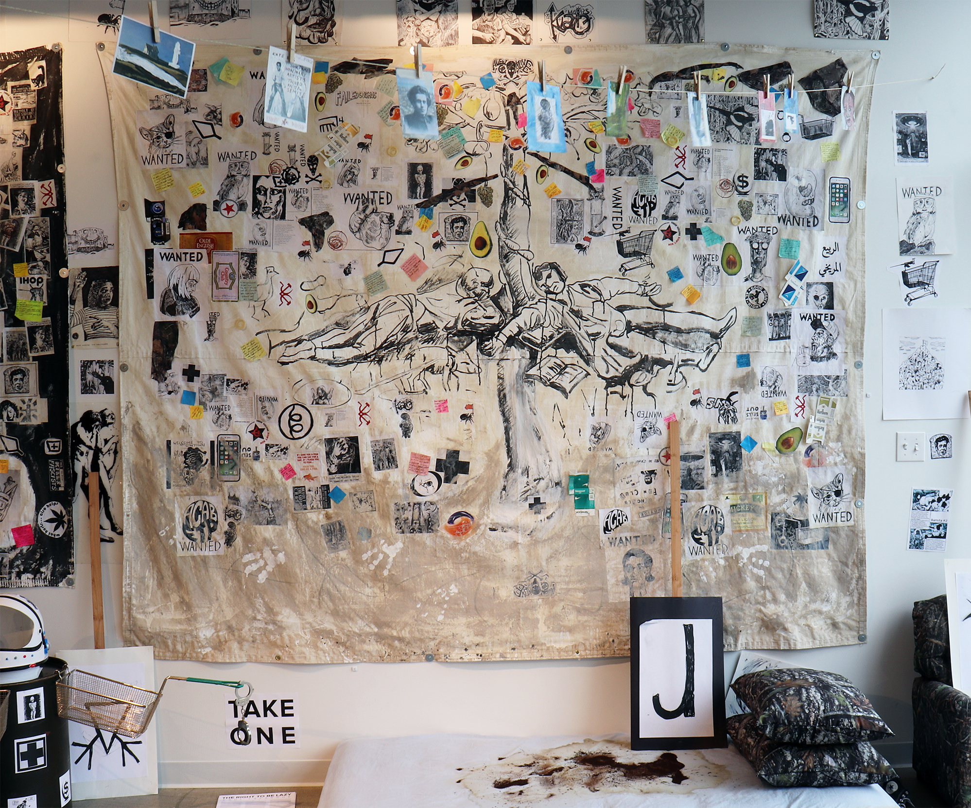 New Lubberland (center). Installed at Artspace 304 (Carbondale, Illinois) Acrylic, post-it notes, coffee, clay slip, photocopies, ink, marker, Sharpie, stickers, mixed media on canvas tarp (2018).