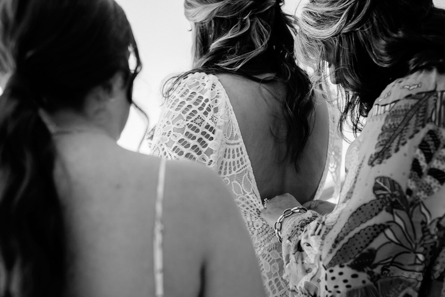 When capturing a bride getting ready for her wedding, we get to witness the love a mother has for her daughter. Knowing that she has probably dreamed of this day since her daughter was born and we are the trusted photographers is very special to us.⁣