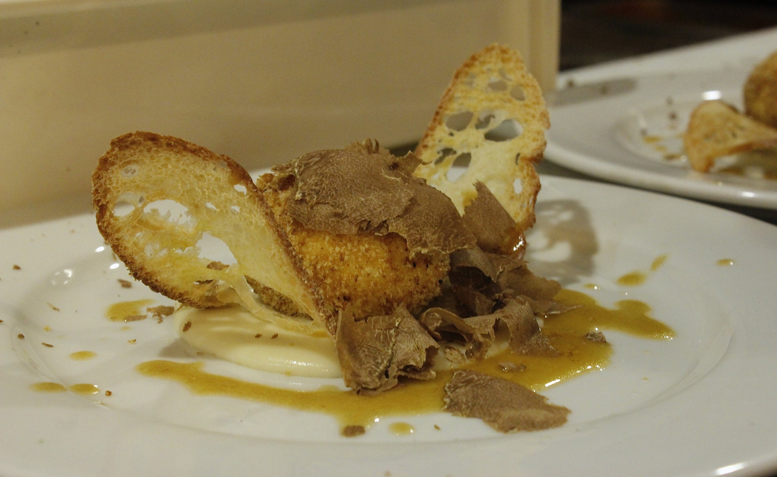  picture of cooked egg dish with truffle 