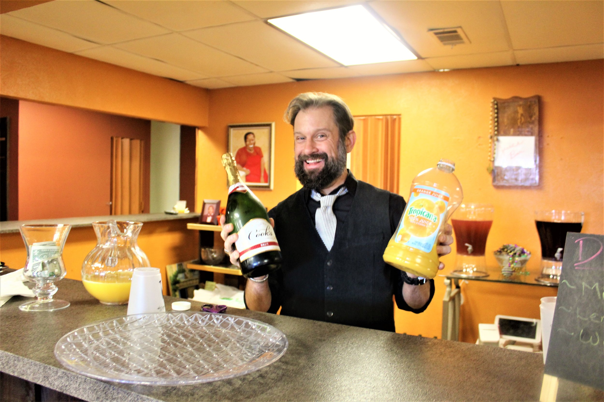 Our bartender serving up endless mimosas with a smile you just can't help but to love.