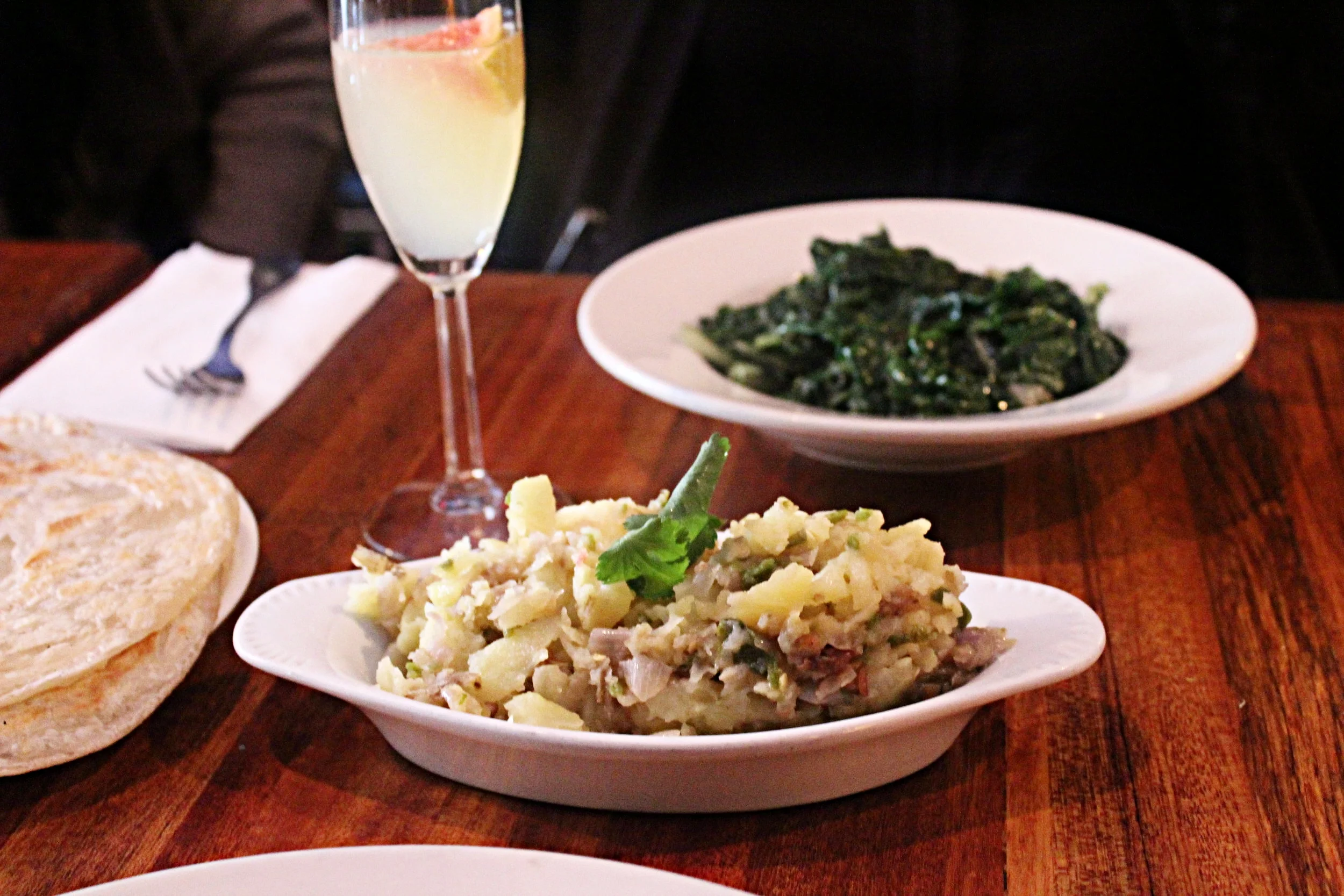 Dinch Azifa-Ethiopian home fries, smashed potatoes with mustard seed, jalapeno and onion