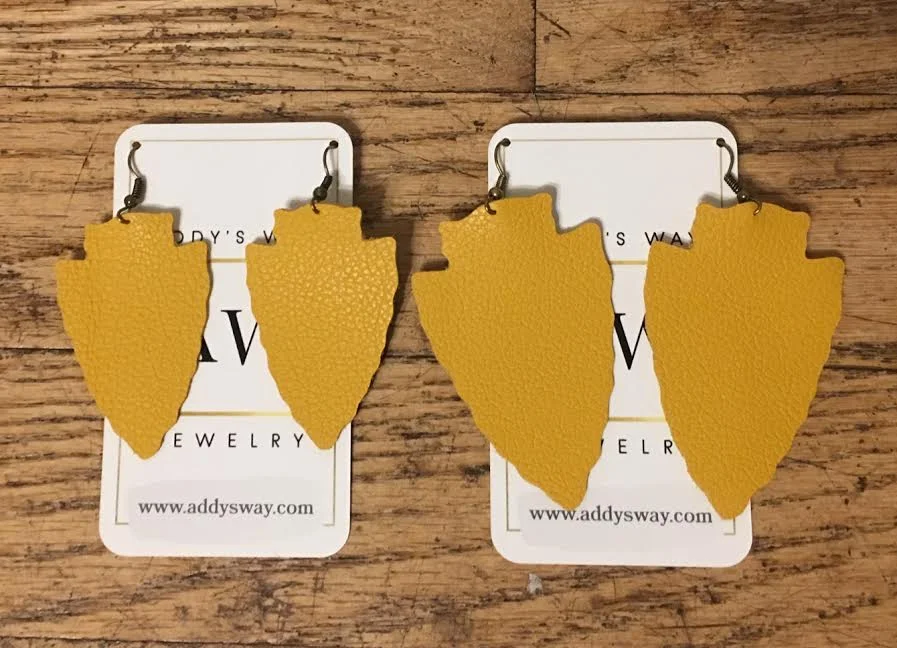 gold arrowhead earrings.jpeg
