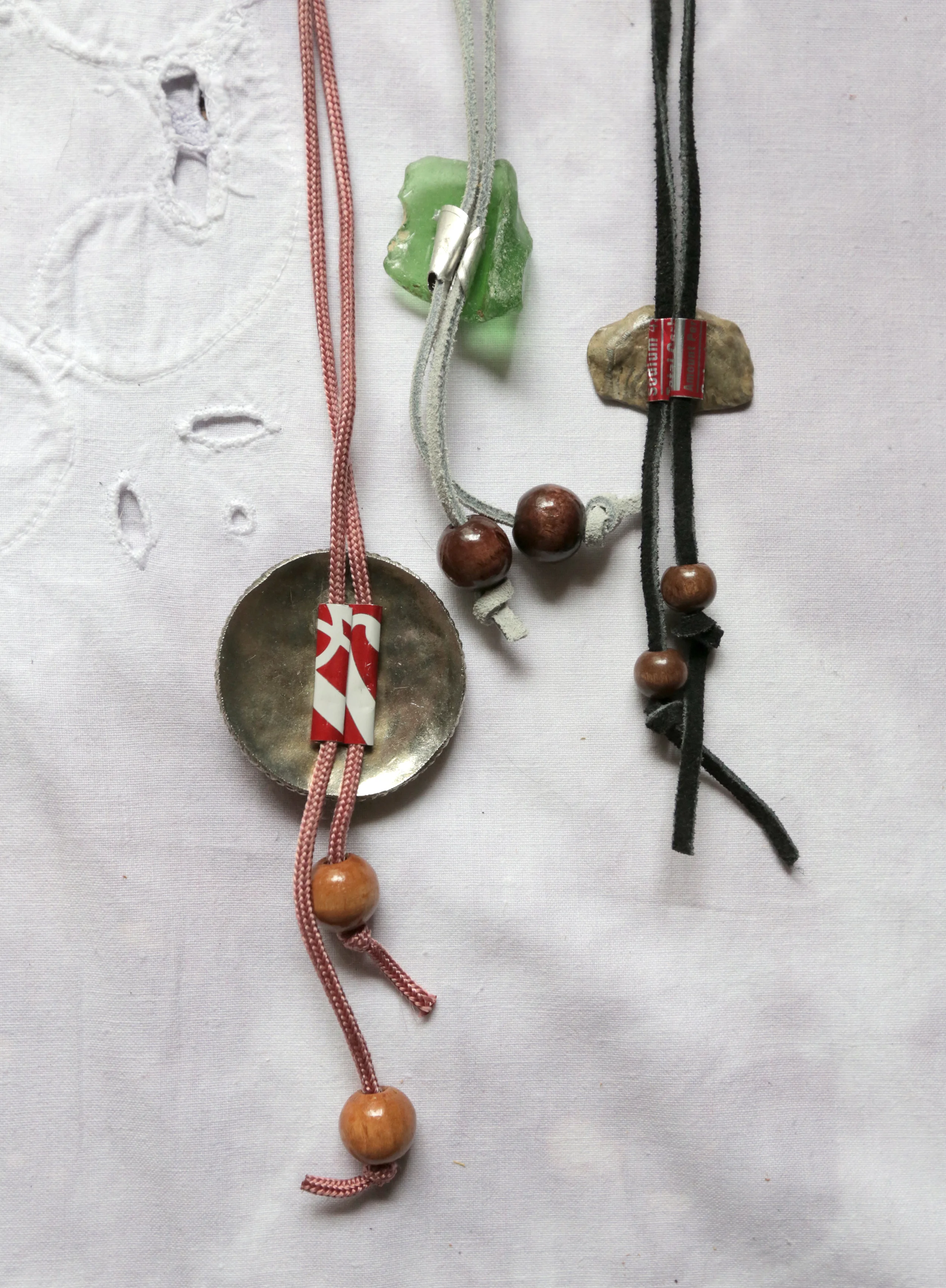 2015 - bolo backsides. creek finds paired with cut soda cans.