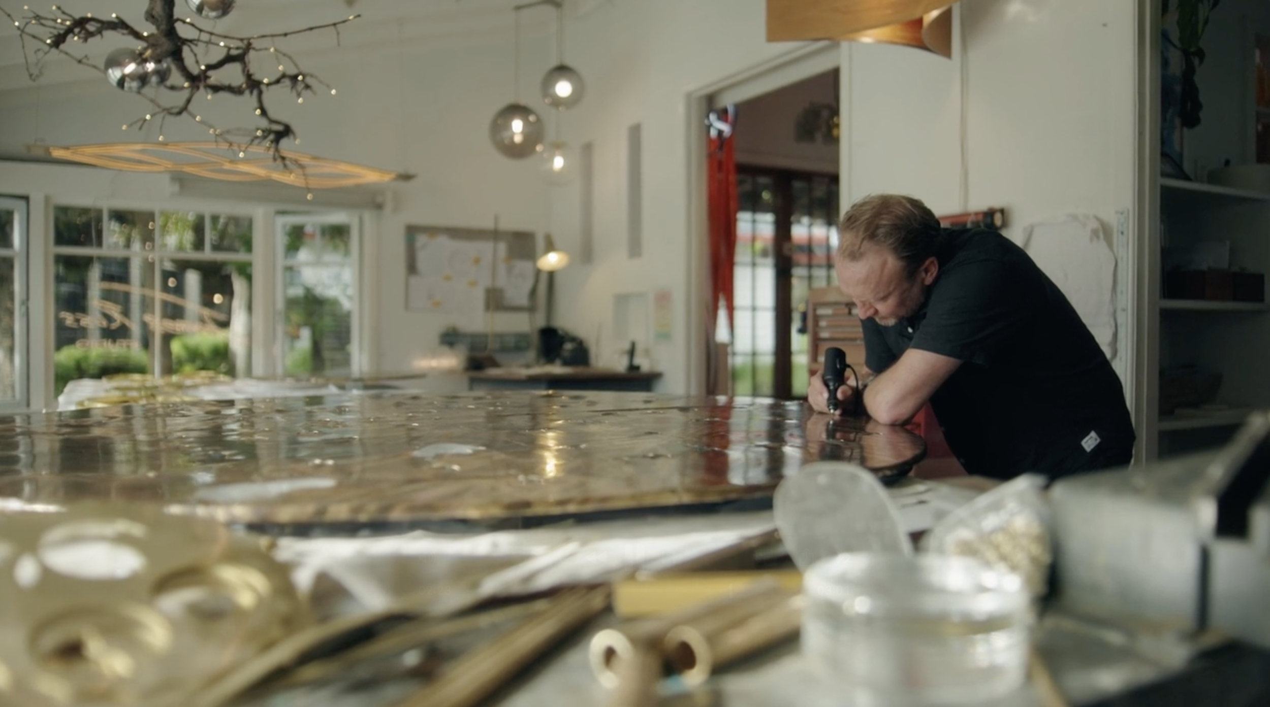 James Russ at his studio working on Brass Wairua