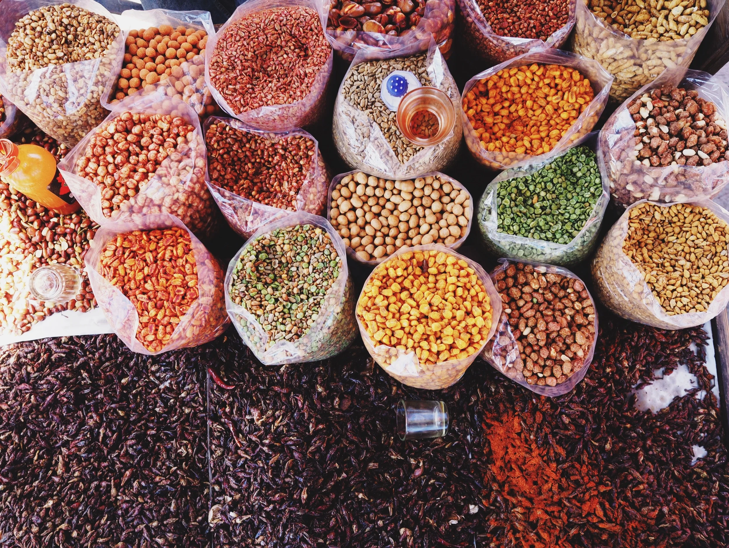 Nuts & seeds, many flavored with chile & lime, & chapulines below