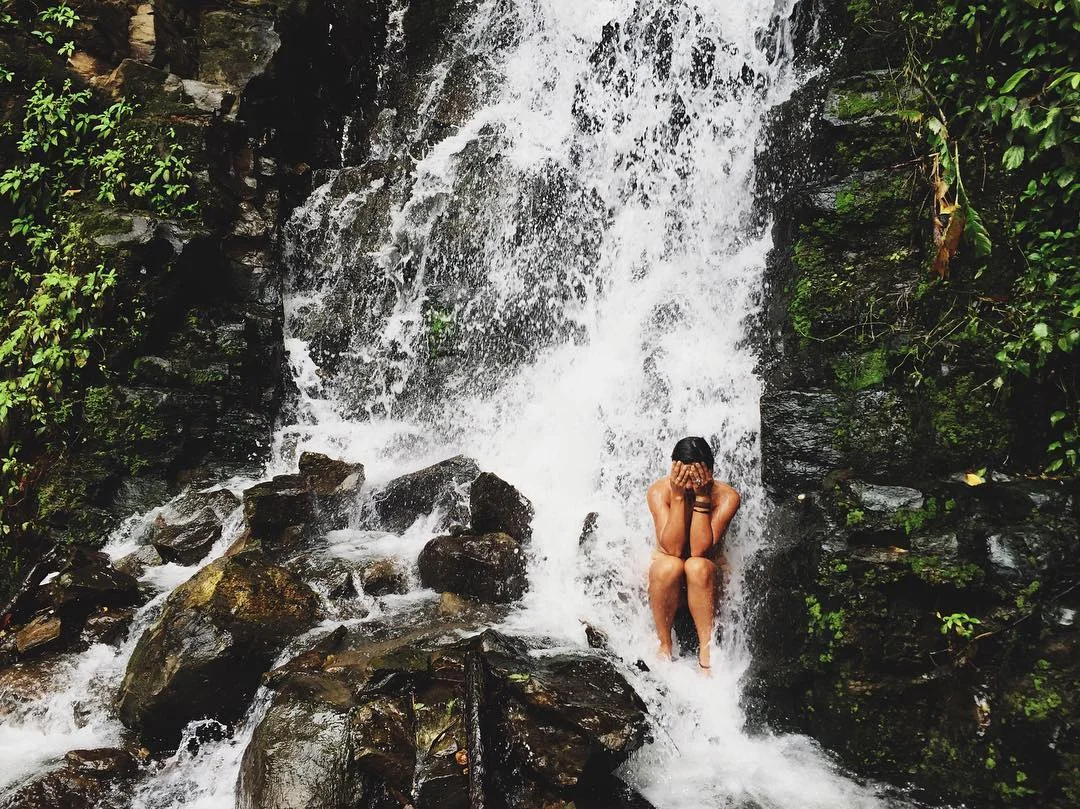 Bathing in a road-side waterfall, Costa Rica's mainland