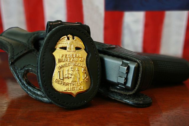 fbi-badge-gun-source-wikipedia.jpg