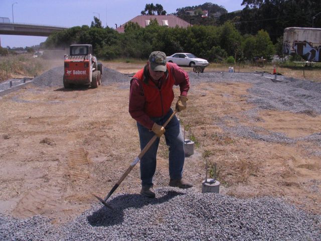 adding gravel ground covering for drainage