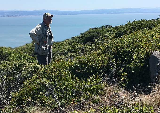 In front of Doug is one of the two known A. uva-ursi forma leobreweri plants on SBM