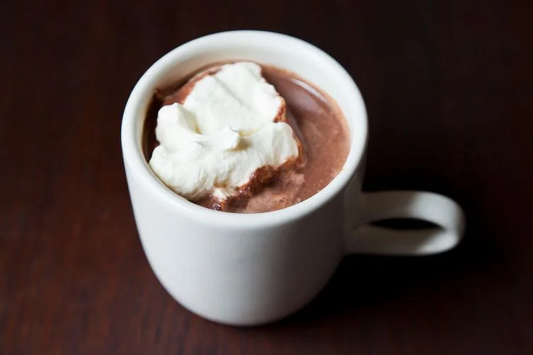 Hot Chocolate Steamed Milk + Housemade Organic Chocolate. Warm, sweet. Enveloping. Great for those crisp Autumn morinings. 