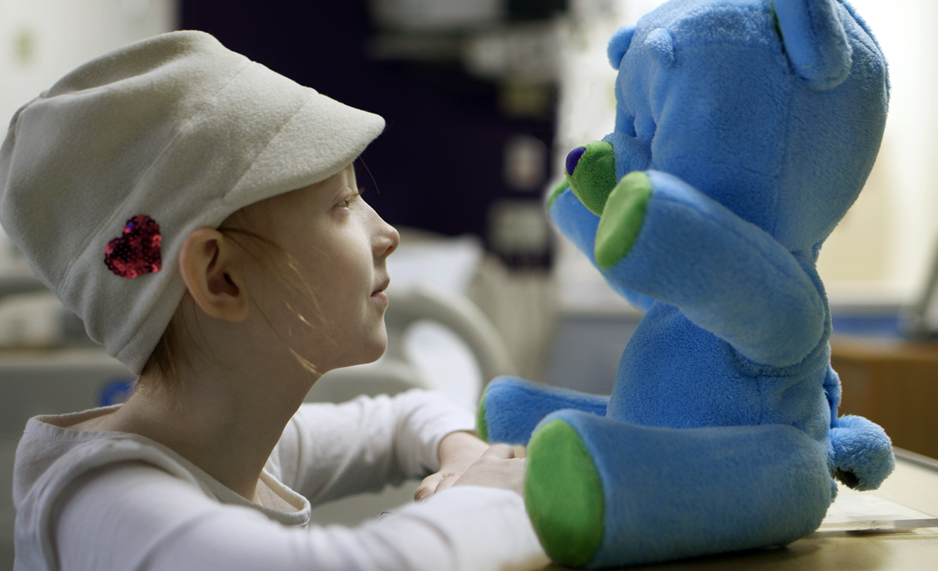 Huggable Robot Befriends Girl in Hospital