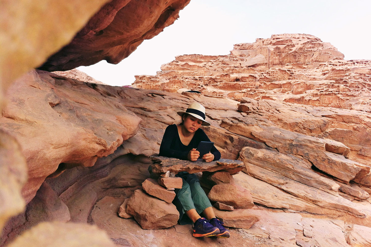 callmenoora-sittingonrock.jpg