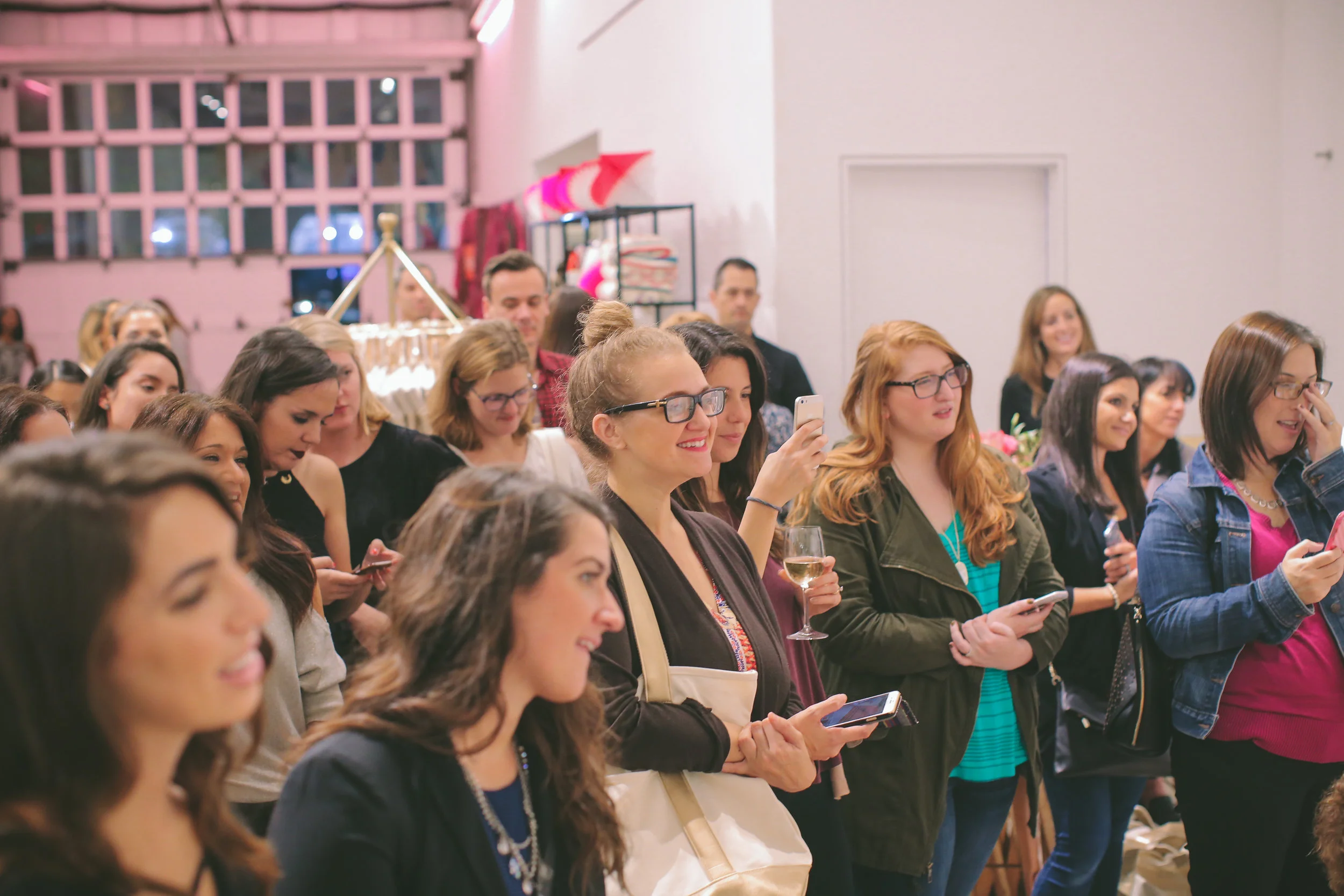 Lots of sweet faces listening to Drew chat about photo books and fun. 