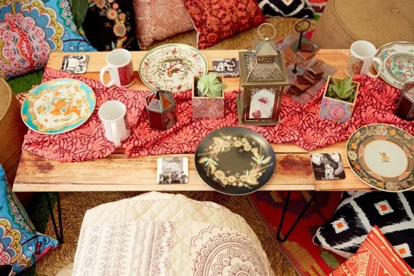 The runner, the mugs, photo cubes turned plant holders, two tiered glass plate with holder, melamine plates that we scanned in vintage china on to were all made using Shutterfly products.