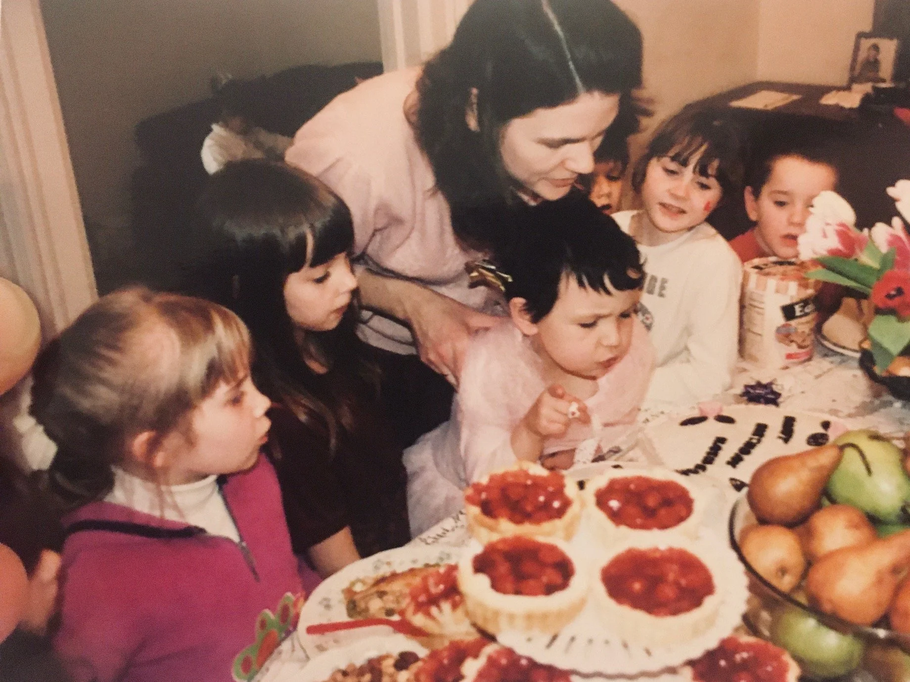 Katherine blowing out her candles