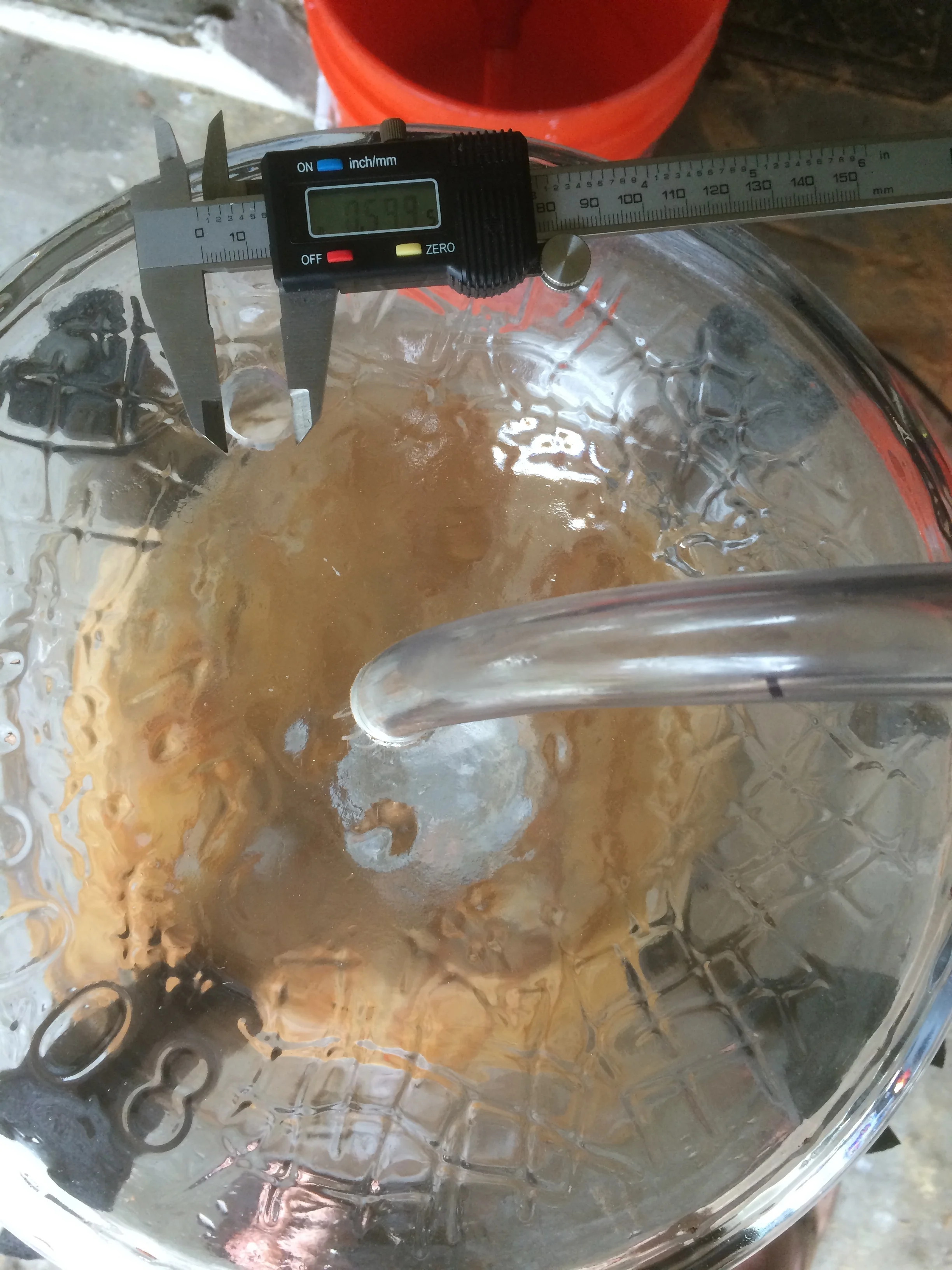 The vessel was a 6 gallon glass carboy. After the base was made, I drilled some ports in the top (bottom) of the carboy to allow liquids to circulate &amp; agitate the culture in a pump-over technique. Shown above are the fill/feed/airlock port in t…