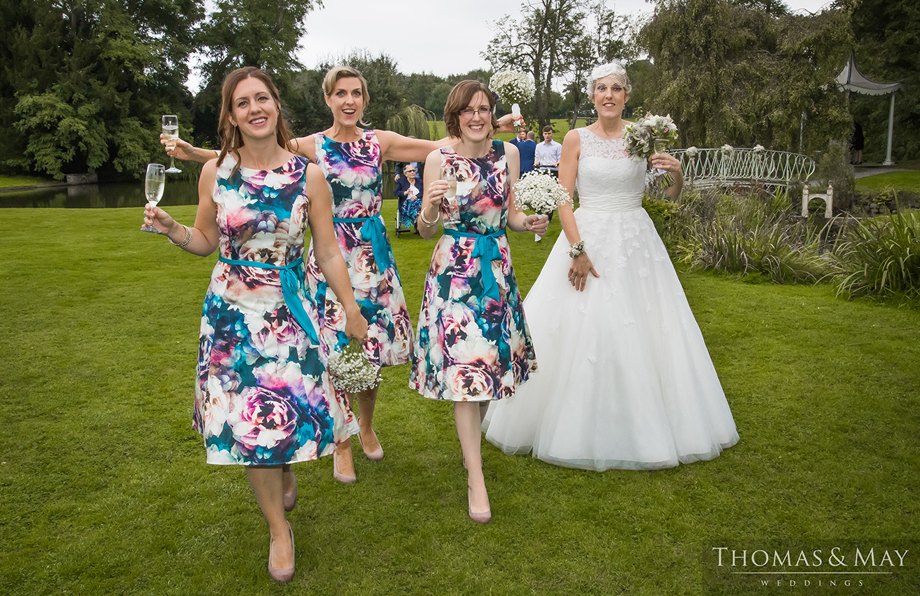 7 bridesmaids dresses and bride.jpg
