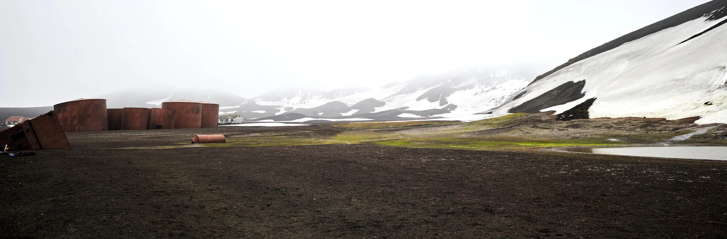1st landing, Deception Island, the caldera of an active volcano which damaged research stations in 1967 & 1969. The ghostly remains of the former whaling station remind us of a sadder era for whales.