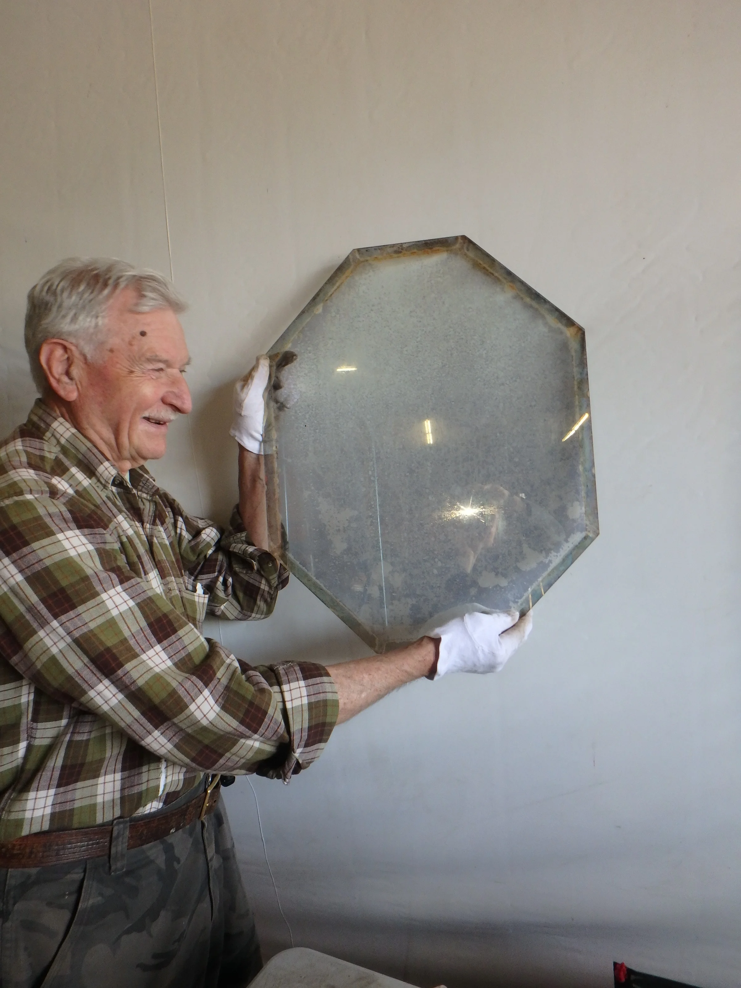 John Lash holding original eyepiece beamsplitter