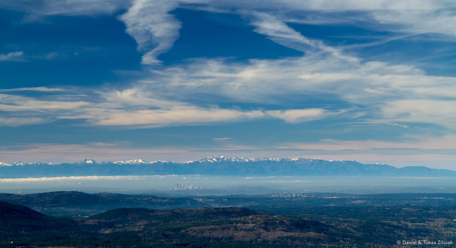 View from the top of Mount Si: The Olympic Mountain Range, and the cities of Seattle and Bellevue in the distance
