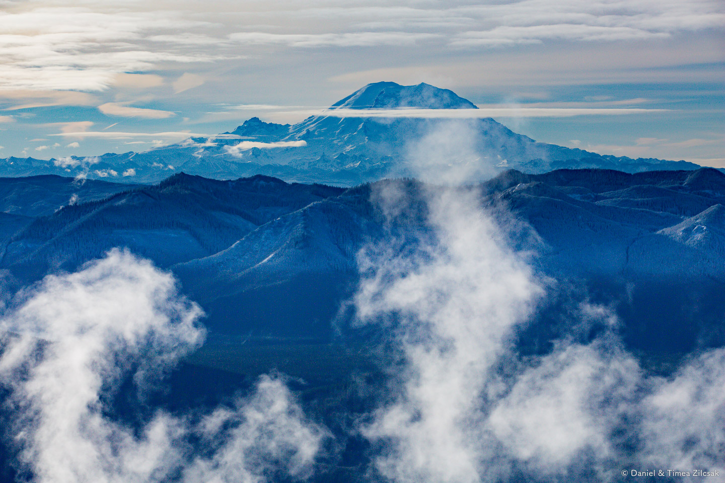 View from the top of Mount Si: Majestic Mount Rainier with Little Tahoma at its side (smaller notch to the left)