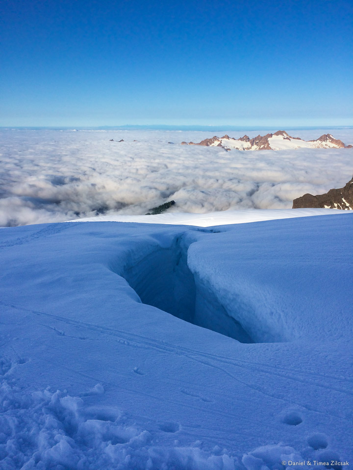 Bridge over a large/deep crevasse on Easton Glacier, Mt Baker Climb
