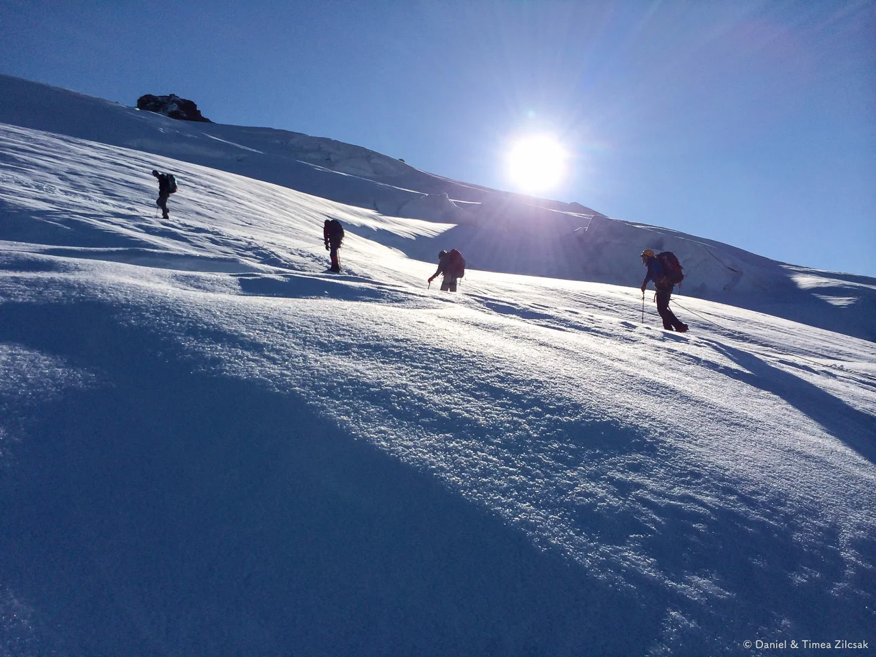 Climbing Mt Baker - Team crossing a crevasse
