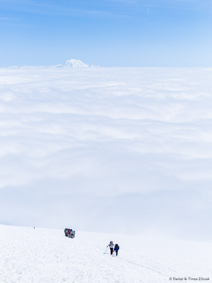 Climbing teams reaching Camp Muir, for a break before they Mount Rainier summit attempt