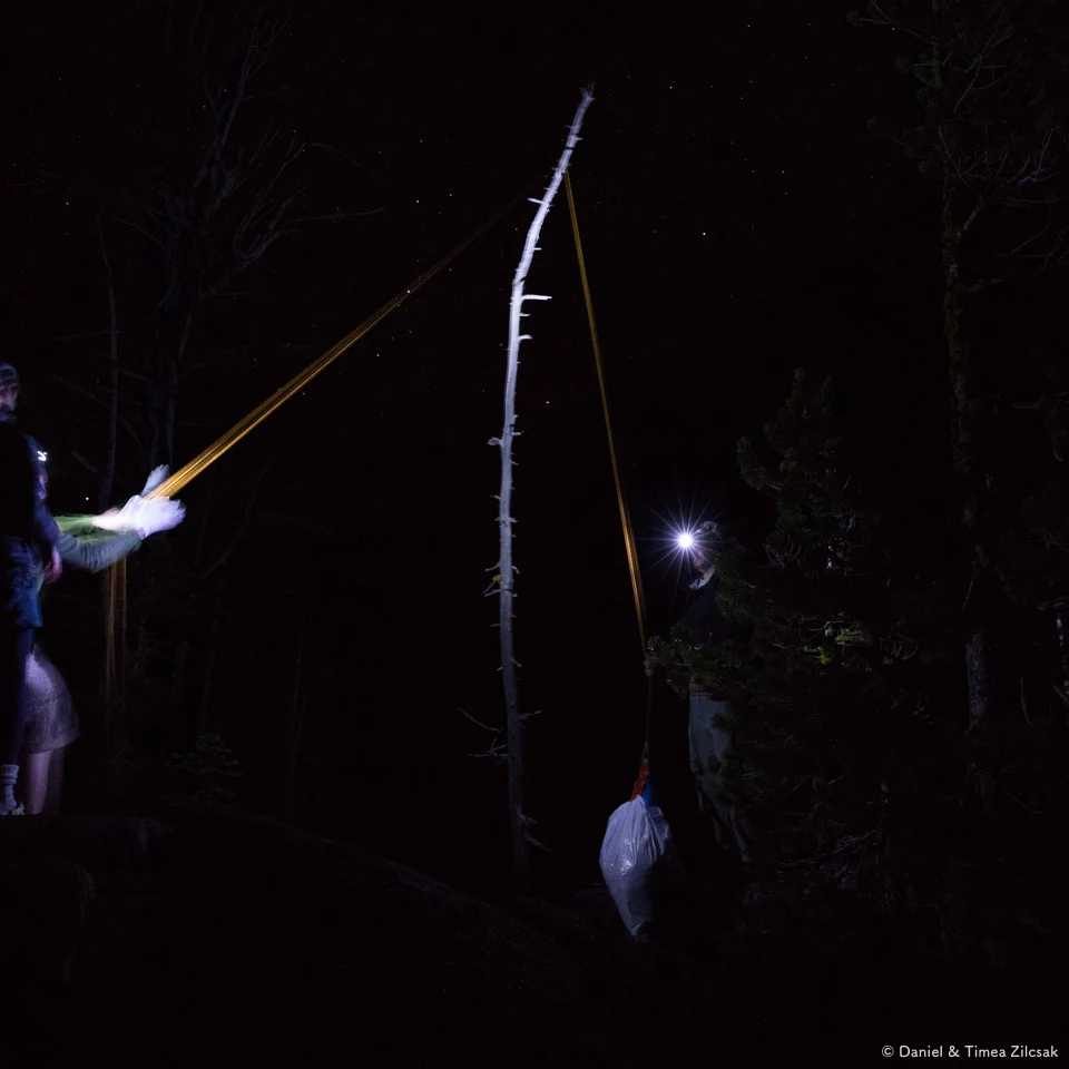 Friends having some trouble hanging food after a few drinks - Backpacking the Enchantments