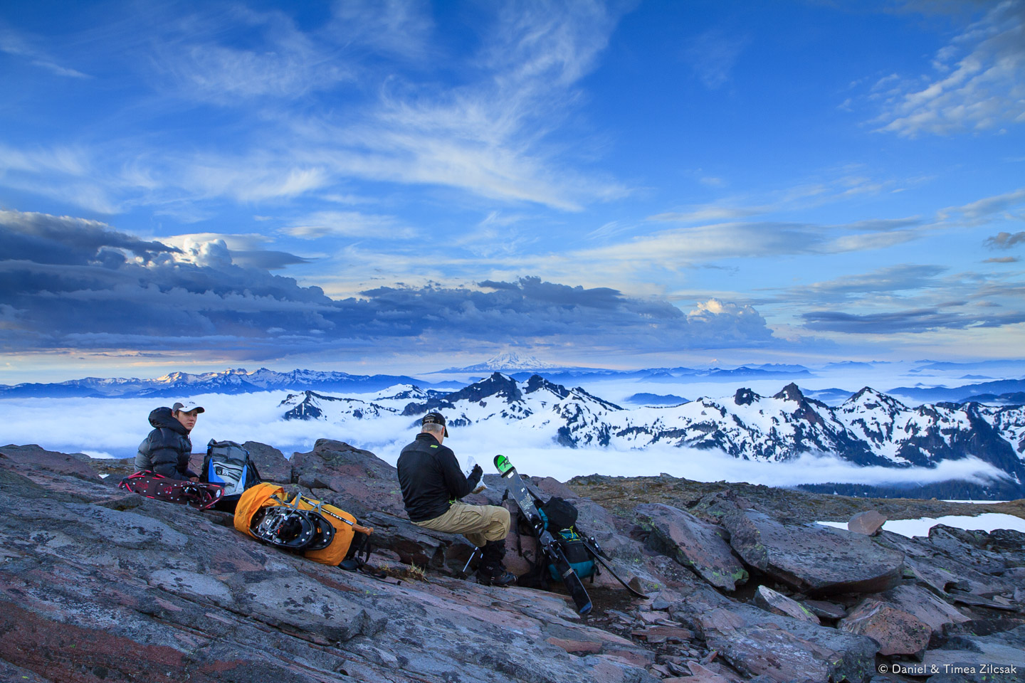 Timea and John resting just below McClure Rock ~7200 ft, near the beginning of the Muir snowfield, Mount Rainier National Park