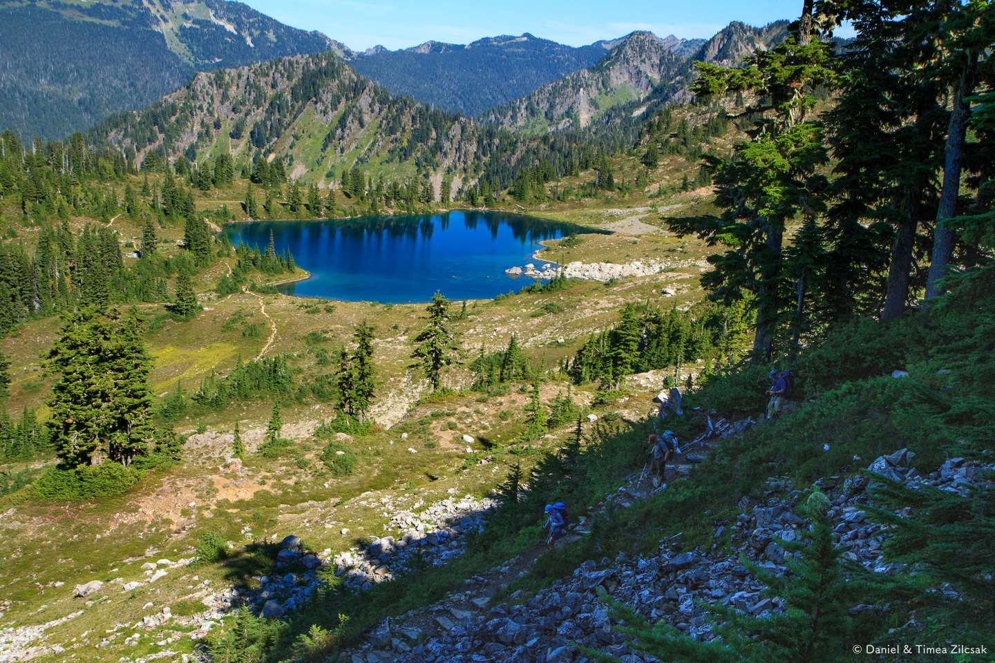 Lunch Lake and the trail leading down into the Seven Lakes Basin from the High Divide Trail 