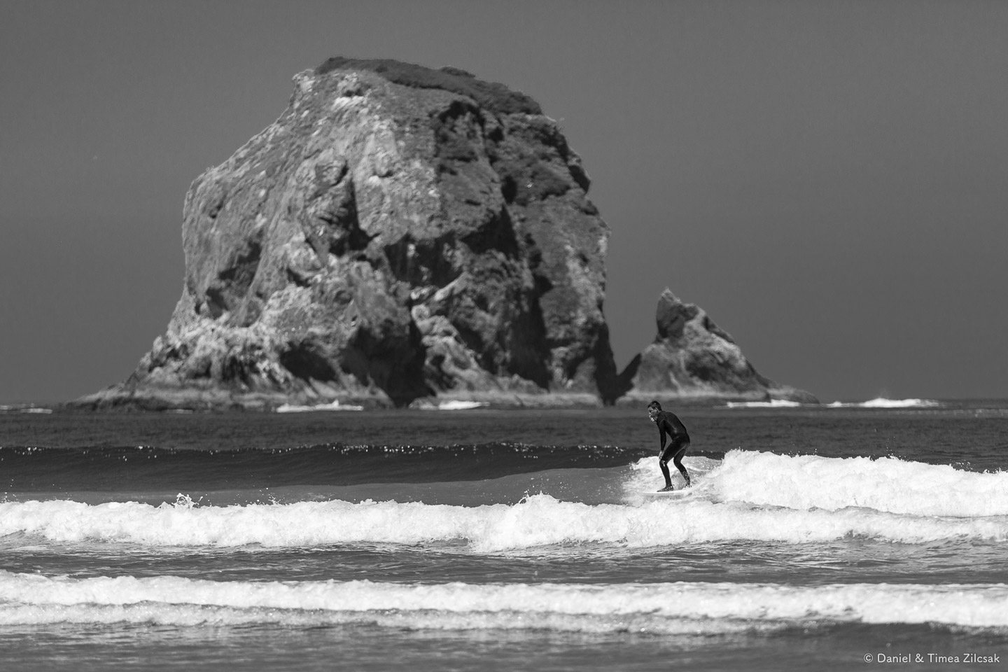 A lone surfer near Point of the Arches