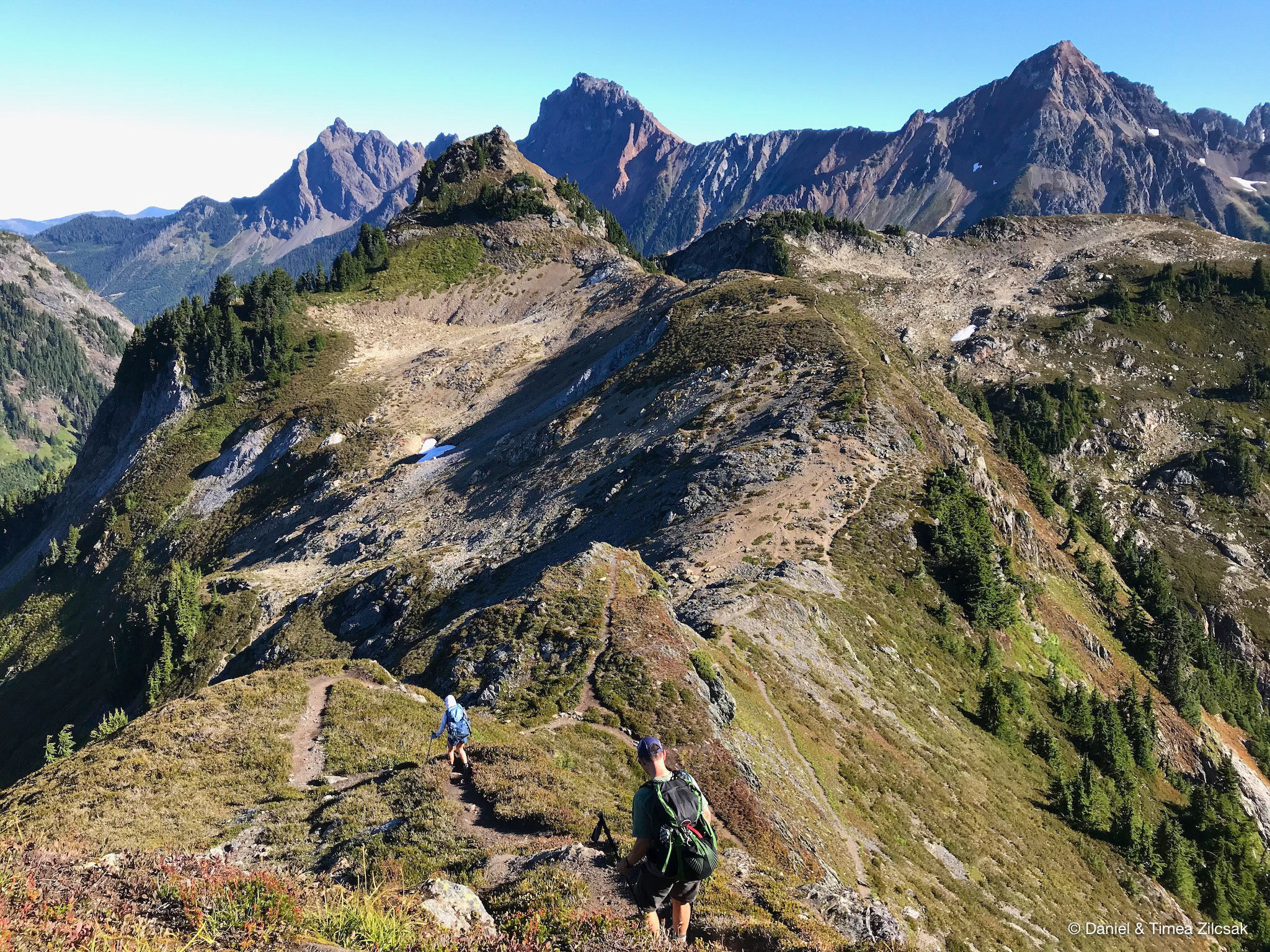 Trail towards the summit of Yellow Aster Butte with Mount Larrabee and American Border Peak in the background