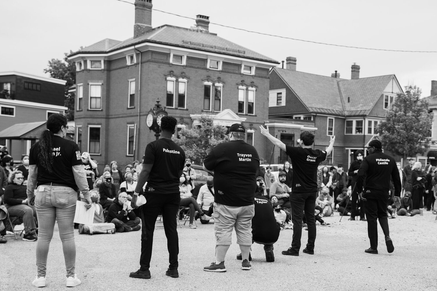 The cast of The Weeping City performs at A Day of Remembrance in Portland, ME on May 25, 2021. From left to right: Stacy Perez, Abdul Ali, Tyler Jackson, Adan Abdi, Noah Bragg and Joseph Jackson. Shirts printed by Little Chair Printing. Photograph by Henry Ametti.