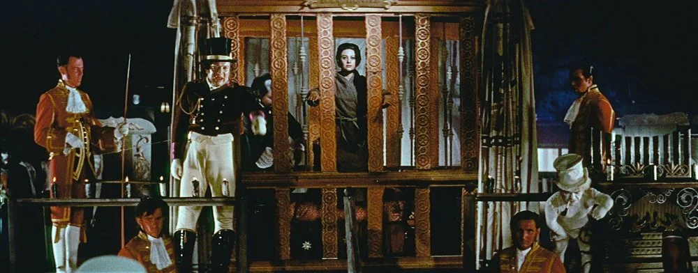 lola-montes-1955-004-lola-trapped-inside-circus-cage-00n-9wk.jpg