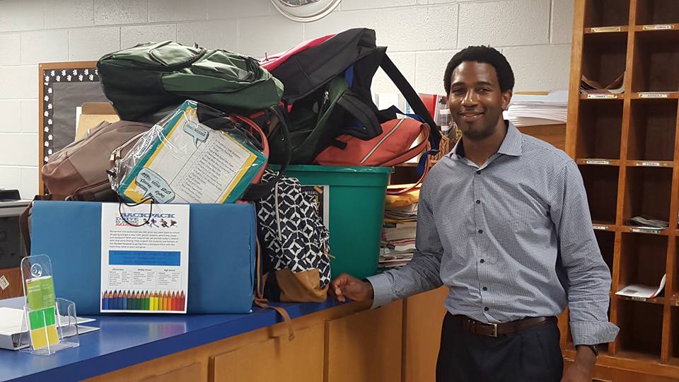 Supply Drive Aaron with Supplies_Aug2015.jpg