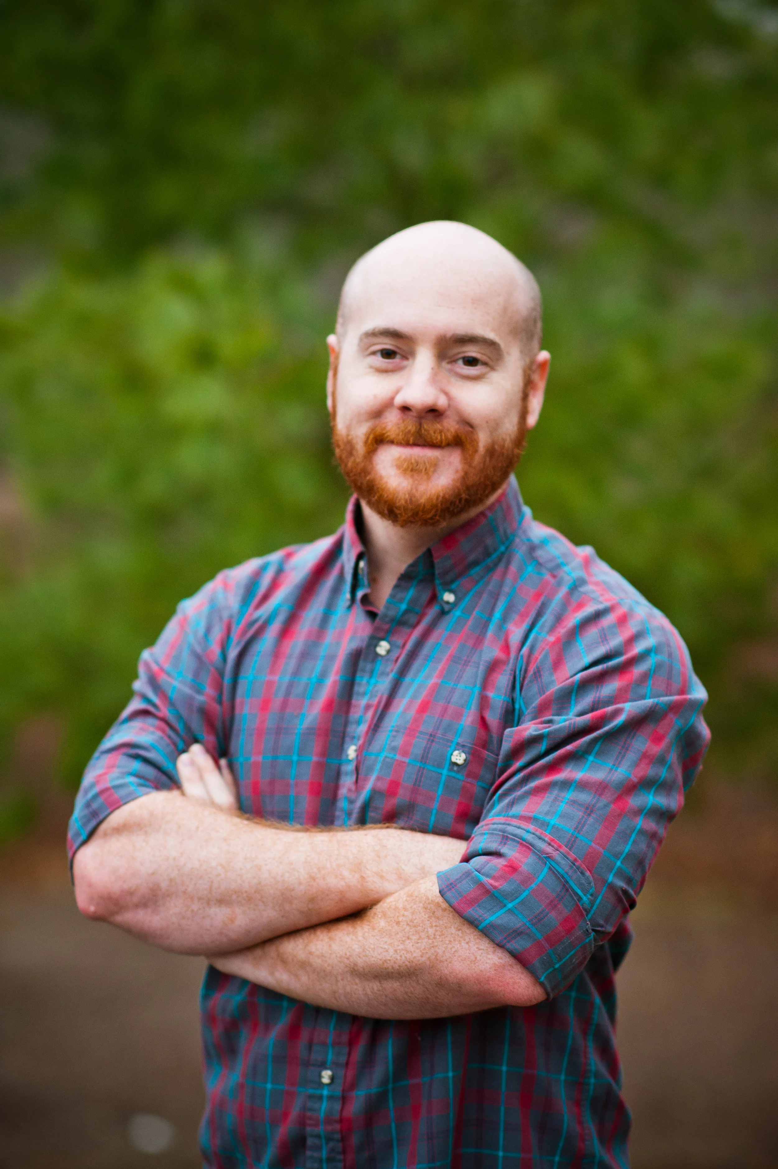 HI I'M JUSTIN! I am the second shooter for Meagan Sharum Photography during events and weddings. Believe it or not, I had no idea how life changing and important photography would be for me when I started working with my lovely wife. I started out assisting Meagan by carrying her equipment and helping out with lighting - after about 4 years of the best slave labor of my life, I joined her behind the lens. Luckily, Meg and I have very different shooting styles. She's my little photo sniper, and I'll be the goof on the dance floor tearing it up, and getting those great wide angle shots of you and your guests having the time of their lives. So where did I start? Theatre. I have over 6 years combined theatrical lighting experience, so it was an easy switch to looking at lighting through a camera. I LOVE deep, dramatic shadows and interesting angles in my photos. As my wife mentioned, I am a huge gamer. I can nerd it out with the best of them - but trust me, I'm super cool! I also love meeting new people! I'm quite the social butterfly, and I could hold a conversation with a curtain if it would only talk back, haha. I am incredibly blessed to have the opportunity to take photos for a living, and even more so to be able to do it with my bride.