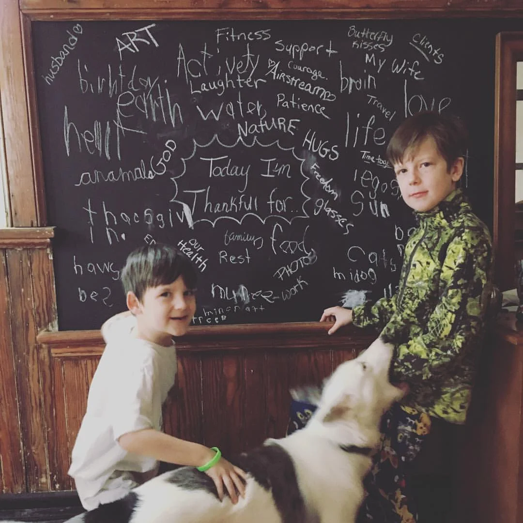 We even still use the chalk boards! Happy belated Thanksgiving by the way!..don't mind our attack dog Kodak! ;)