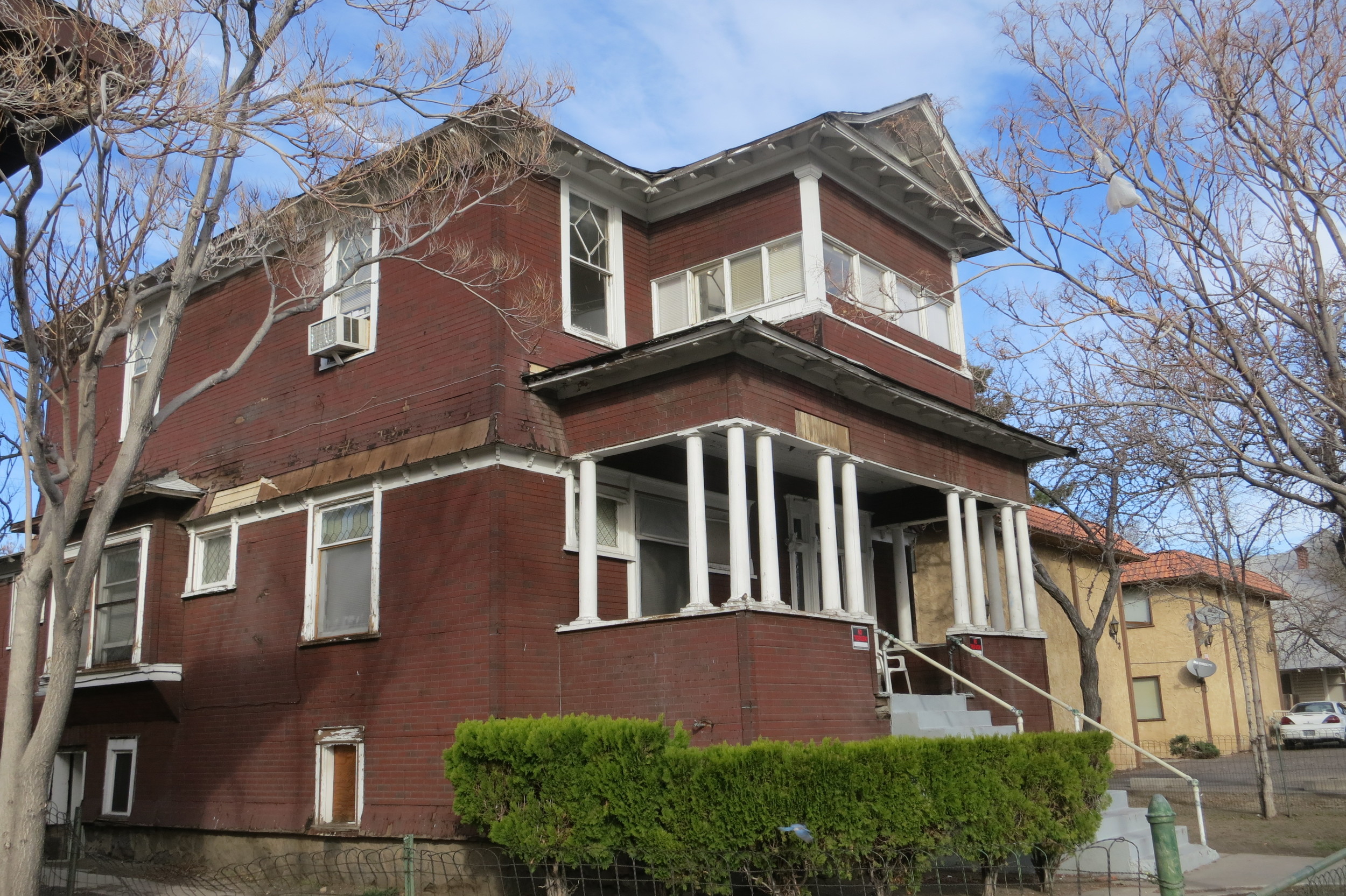 Several rehab patients live in this old home, helping each other stay sober while taking nearby buses to service providers.