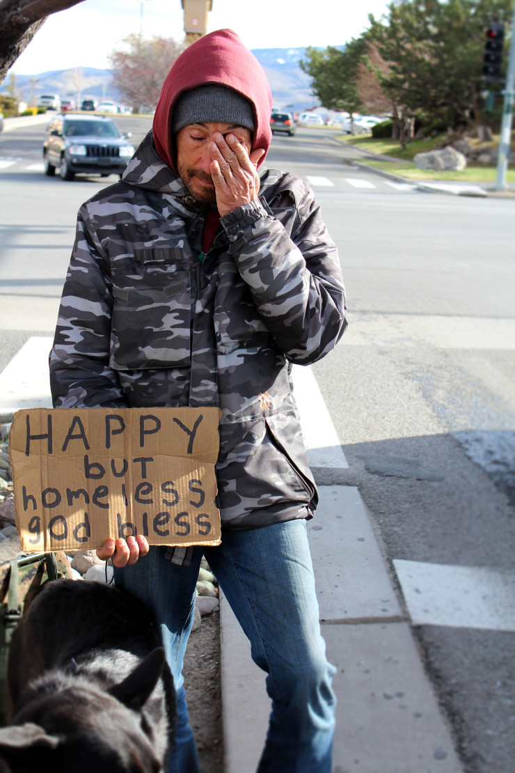Matt, a homeless man, stands near a shopping center in Reno, trying to get money to afford another night in his motel. Before wiping his eyes, he mentions that he has allergies, and this time of year is hard for him to be on the streets.