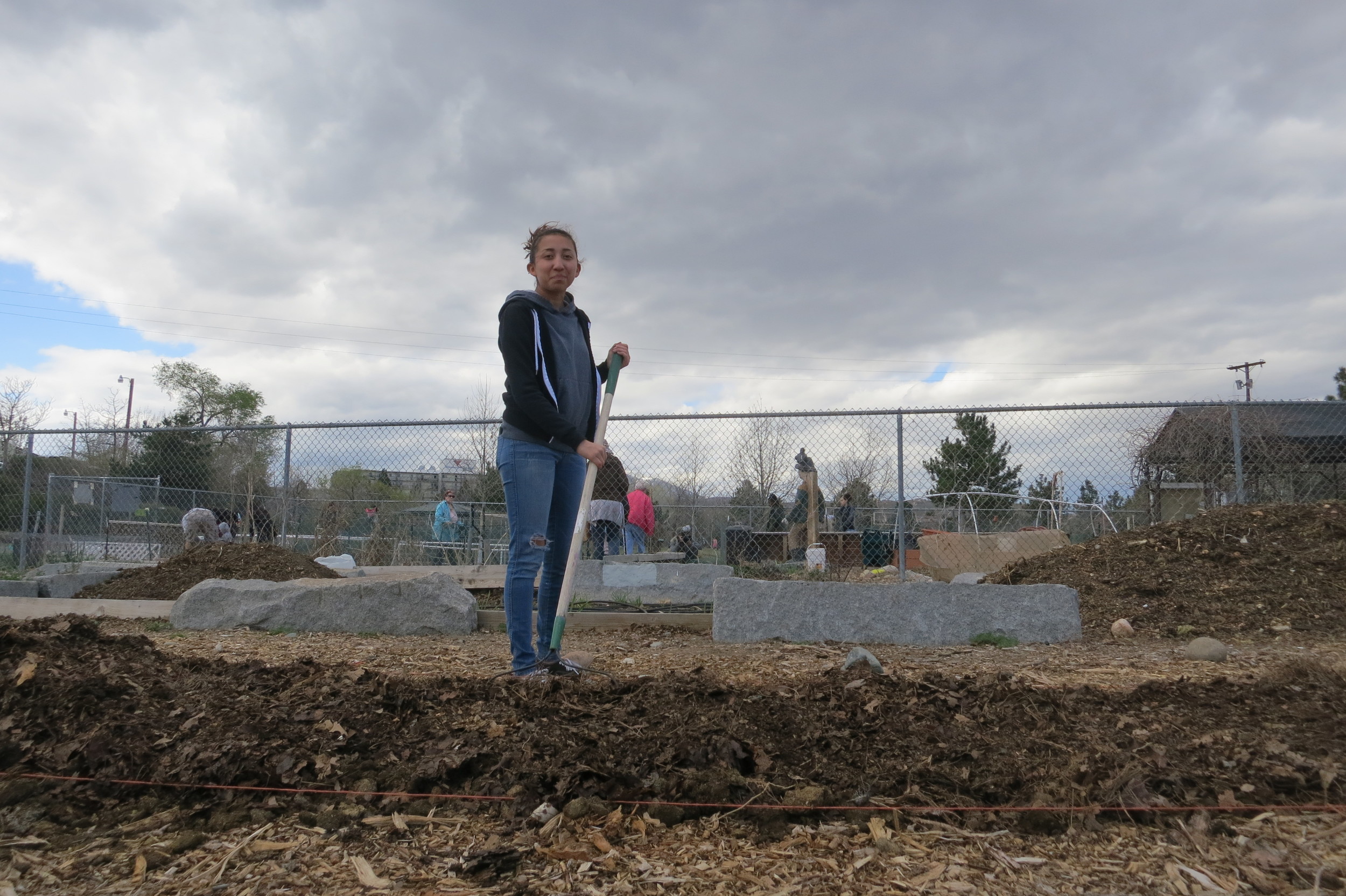 "We're just volunteering, trying to make a difference. We're just trying to help out the community and learn new skills. It brings people together, and it teaches people how to grow their own food and be more local and more natural," one of the many volunteers said.
