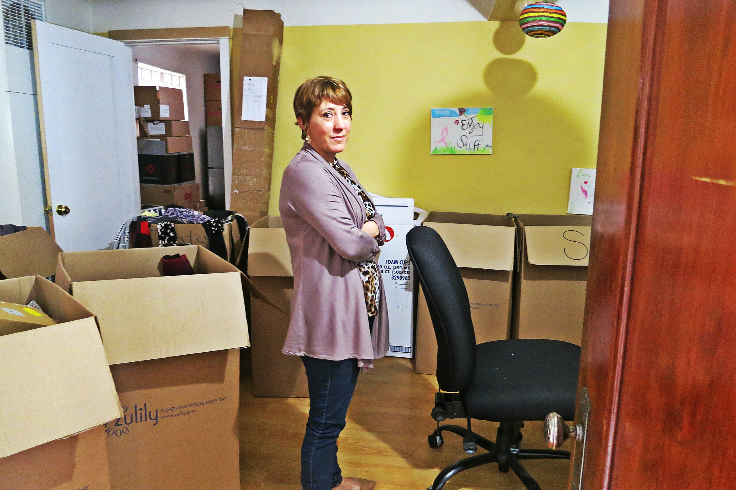 Michele stands in a room devoted to donated items. “We’re letting them come in here two at a time to take what they need.”