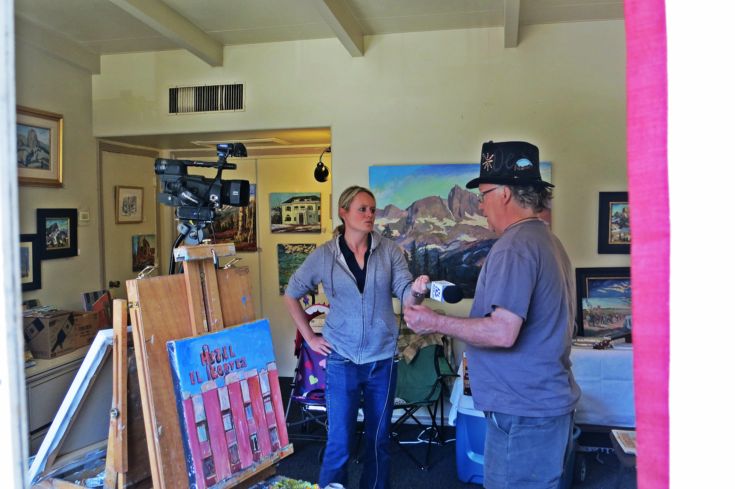 Bright Lights: Holland, being interviewed by KOLO 8 News Now on Sunday June 19, 2016, has been a constant advocate for the arts and outdoors in Reno.