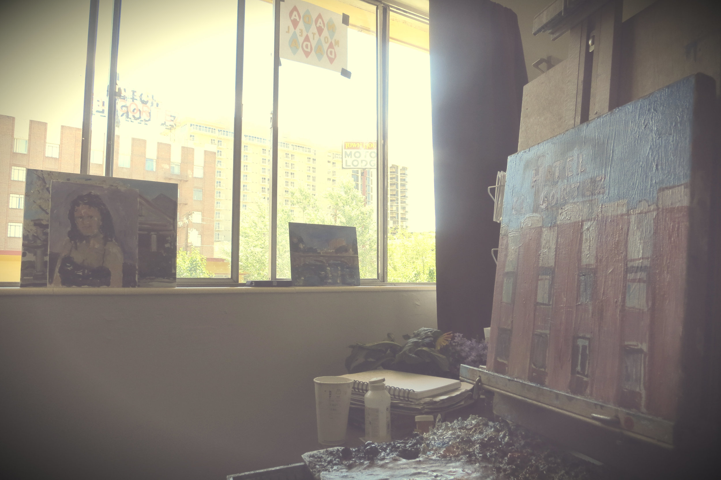 Painting the El Cortez Hotel across the street while hoping it doesn't go down. Photo from June 19, 2016, as Nada Dada concluded its 10th edition.